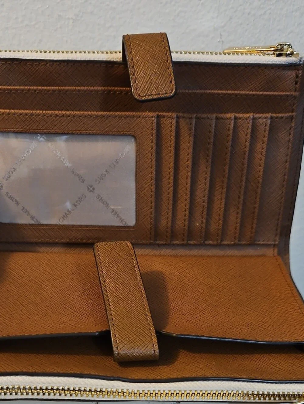 Michael Kors White Logo Print Phone Wristlet with Tan Strap